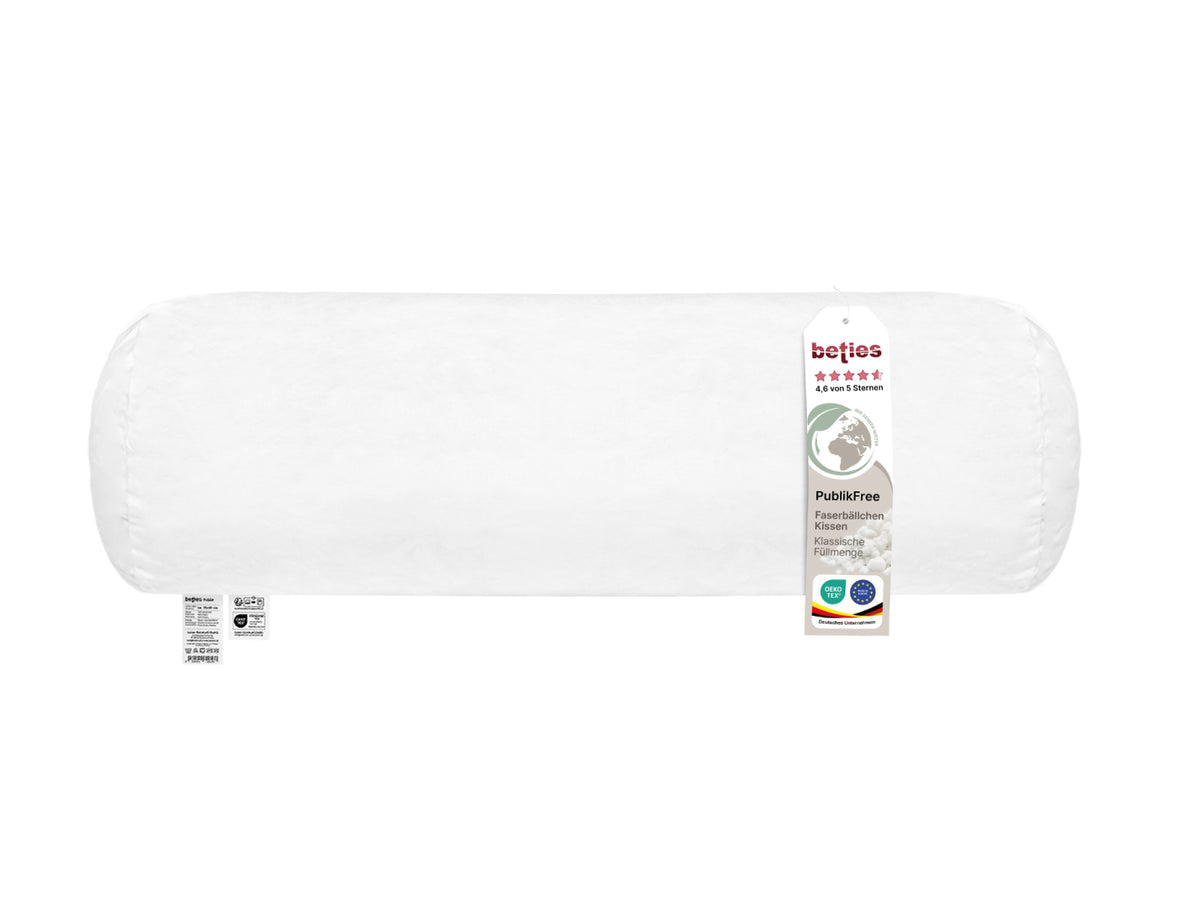 beties PublikFree Polyesterflocken Nackenrolle 15x40 cm – Nahaufnahme Pflegeetikett, Materialzusammensetzung 100% Polyester, vegan, waschbar, Made in Europe