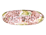 Ansicht eines runden Kissens im Landhausstil von unten mit dem Reissverschlusses, bedruckt mit rosa/pinken Hortensien-Blueten.
