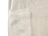Detail der Soft-Leinen-Struktur am beties Savu Sauna-Kilt 70x140 cm in Heubeige