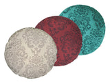 Drei runde Kissen hintereinander, bezogen mit Kissenbezuegen in den Farben Beige, Rot und Petrol. Bedruckt sind die Bezuege mit barocken Ornamenten in der jeweiligen Farbe, nur etwas dunkler.